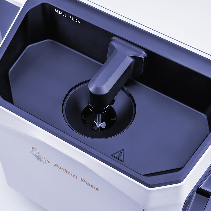 Close-up of Anton Paar Litesizer DIF 500 Small Flow unit with sampling arm in the measurement area