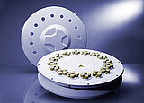 Microwave Synthesis & Synthetic Chemistry The Rotor 64MG5 is specially designed for high throughput and library generation and development in gram scale. Its reliable setup features 64 disposable glass vials arranged in 16 groups of four. Proper sealing with modified screw caps allows the use of 5 mL standard vials for reaction conditions of 200 °C and 20 bar.