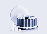 Numbered digestion vessel rack with white-capped microwave digestion vessels, translucent lid, and vessel components.