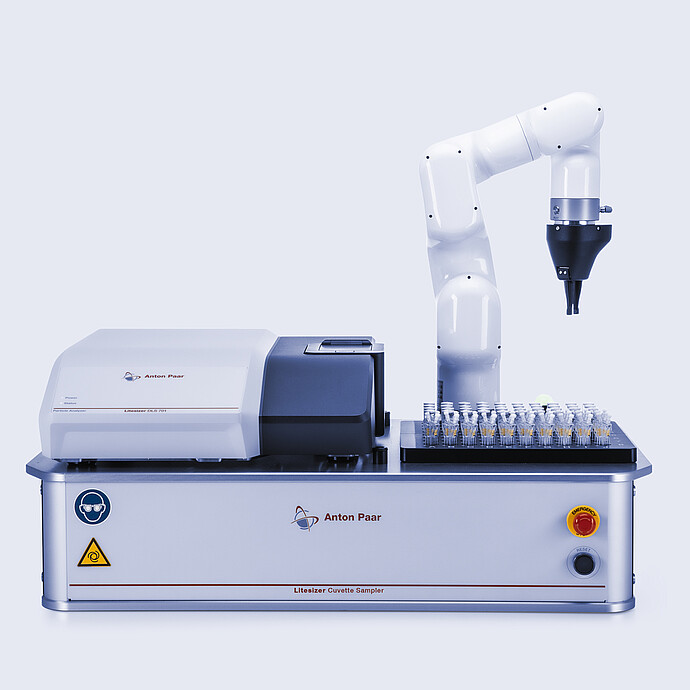 Litesizer DLS 701 nanoparticle analyzer combined with Litesizer Cuvette Sampler and robotic arm automatically loading multiple sample cuvettes on an Anton Paar automation platform.