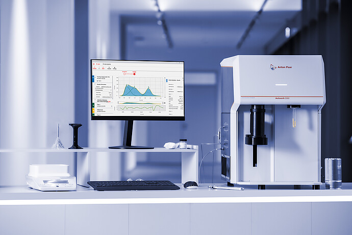 Anton Paar Autosorb 3300 chemisorption analyzer on a lab bench with a monitor showing measurement graphs