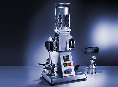 Grease Working Machine: GWM 5 Two-place grease working machine with stroke counter.